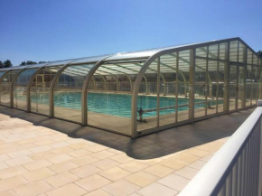 Chalet de 2 chambres avec piscine partagee jardin clos et wifi a Grandcamp Maisy